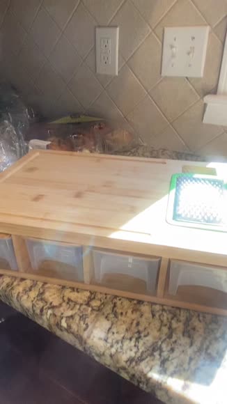 Video review of Cheer Collection Bamboo Cutting Board with with Integrated Graters and 4 Storage Trays  by feeinfluencedme