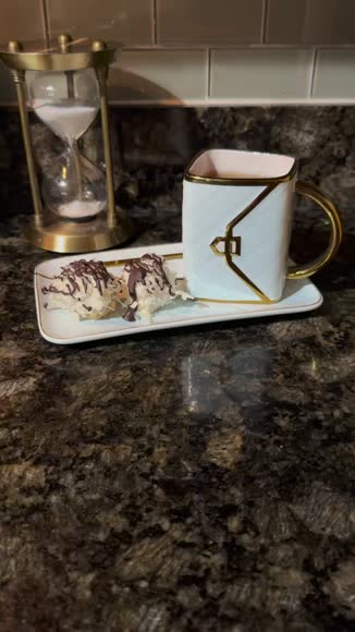Video review of Debelleo Classic Handbag Coffee Mug with Saucer and Spoon  by 66ba7712b3889f18d29dd231