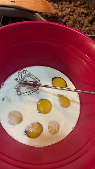 Video review of Zulay Kitchen Egg Beater Push Whisk  by 