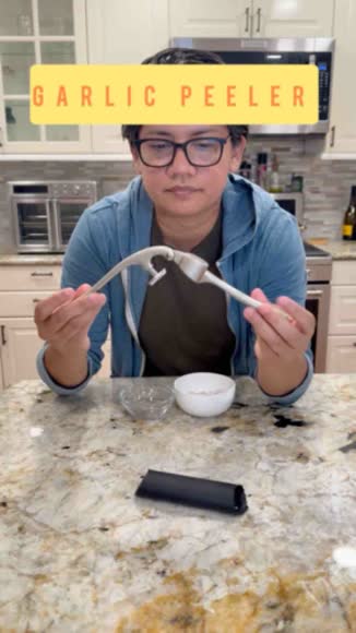 Video review of Zulay Kitchen Garlic Press With Silicone Peeler and Brush  by 678f0f90f0cb7dd0df148adf