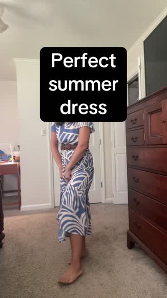 Video review of PALERMO Boho Printed Short Sleeve Flare Tiered Dress  by 6775a8db62aeb456e803e71e