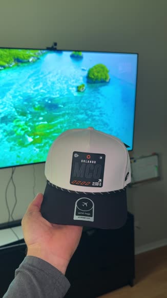Video review of WRLD TAGS Mco - Orlando Revolve Performance Hat  by 67a7ad758b456d6582223dd9
