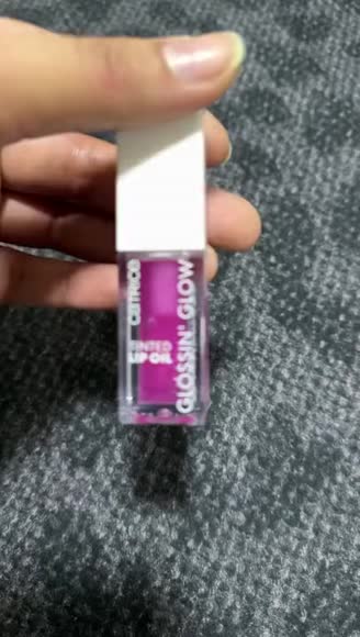Video review of Catrice Glossin' Glow Tinted Lip Oil  by 65cc353b85237dc14fb2ba29