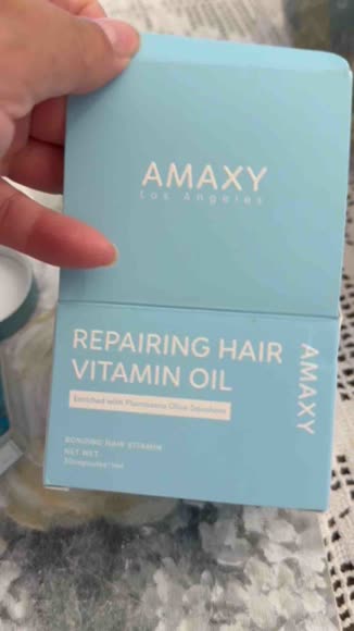 Video review of Amaxy Repairing Hair Vitamin Oil, with Baobab Oil, Marula Oil, Squalane, and Keratin - Nourishing Serum for Shine, Frizz Control and Heat Protection  by 6786ef8bed2afe18e138139f