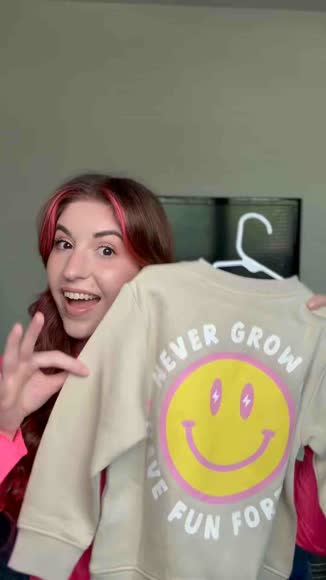 Video review of Little Trouble Never Grow Up Crewneck  by 63385276159bf4e5a0098929