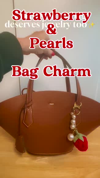 Video review of Ellison+Young Strawberry And Pearls Bag Charm  by 676dda15cceb9b07605cb968