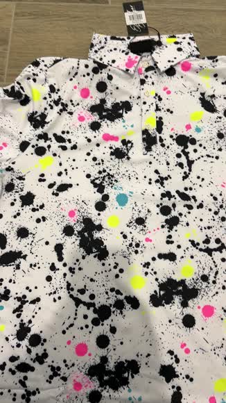 Video review of Sunday Swagger Mens Polo - Splatter  by 675610a81e005d95fb84b6fa