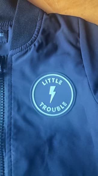Video review of Little Trouble Trouble Bomber Jacket  by 67f9c4d5ce227569e99da072