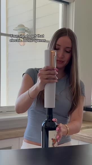 Video review of Vin Fresco Battery Powered Electric Wine Bottle Opener With Foil Cutter  by hello1231426389743