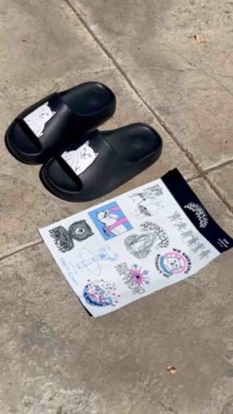 Video review of RIPNDIP Lord Nermal Cloud Slides  by 683c1379f1339030112489d2